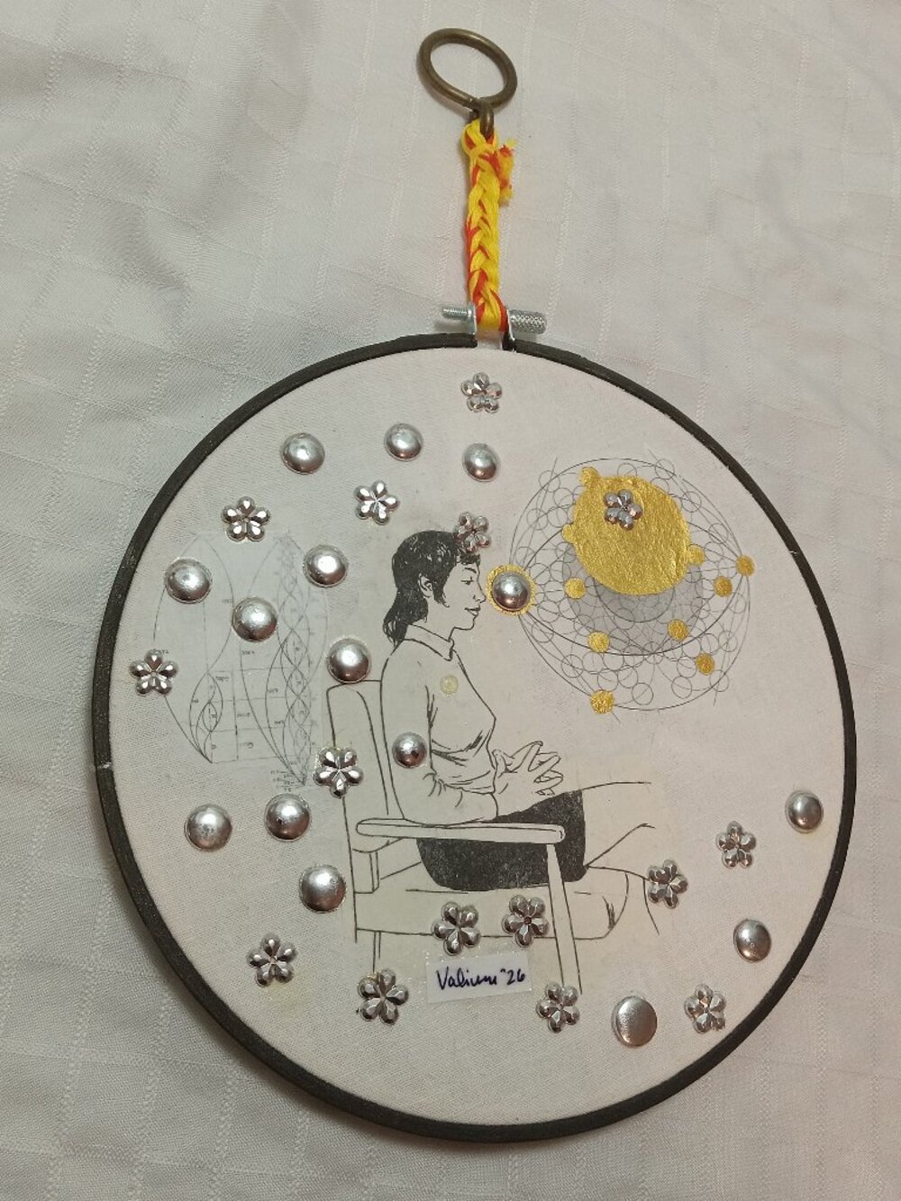 Handmade prints of old magazines on cotton & mixed media in a cross-stitch hoop